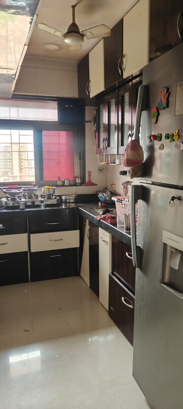 Kitchen in 2 BHK Apartment at Tilak Shanti CHS, Tilak Nagar – for Rent
