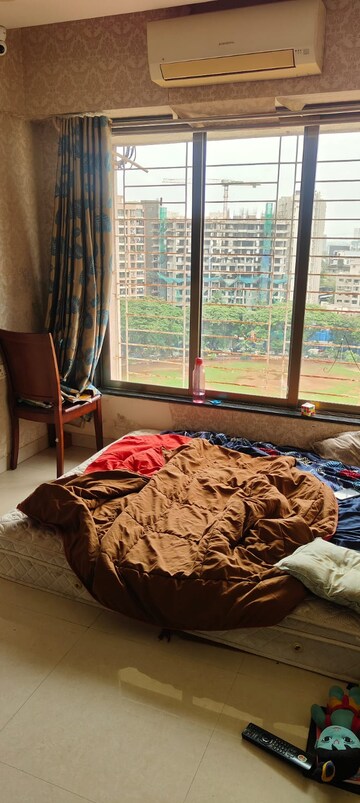 Bedroom in 2 BHK Apartment at Tilak Shanti CHS, Tilak Nagar – for Rent