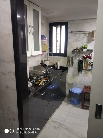Kitchen in 4 BHK Apartment at L Nagpal Bhagwanti Heights, Khar West – for Sale