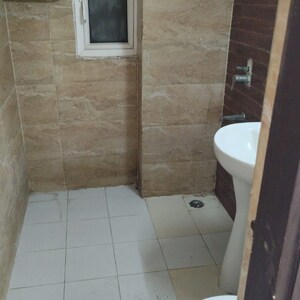 Bathroom in 2 BHK Apartment at Amrapali Zodiac, Sector 120 – for Sale