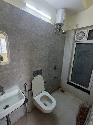Bathroom in 2 BHK Apartment at Omkar Signet, Malad East – for Rent