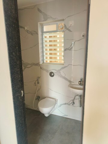 Bathroom in 1 BHK Apartment at Raunak Bliss, Ghodbunder Road – for Rent