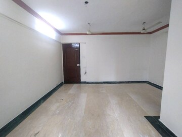 Living Room in 2 BHK Apartment at Laxmi Royal Classic, Mulund West – for Rent