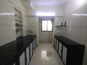 Kitchen in 2 BHK Apartment at Laxmi Royal Classic, Mulund West – for Rent