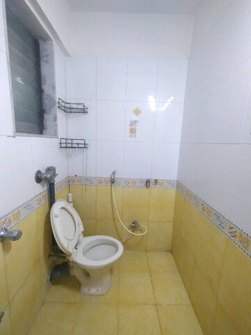 Bathroom in 2 BHK Apartment at Laxmi Royal Classic, Mulund West – for Rent