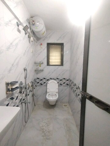 Attached Bathroom in 2 BHK Apartment at Laxmi Royal Classic, Mulund West – for Rent