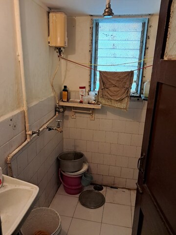 Bathroom in 1 BHK Apartment at Vidya Vihar Building, Ghatkopar East – for Rent