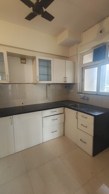 Kitchen in 2 BHK Apartment at Hiranandani Meadows, Manpada – for Rent