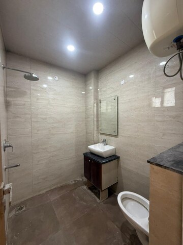 Bathroom in 3 BHK Apartment at Vasant Kunj Enclave – for Rent