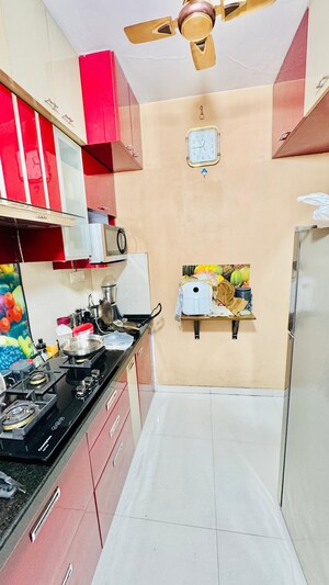 Kitchen in 1 BHK Apartment at Kishor Sukur Enclave A, Ghodbunder Road – for Sale