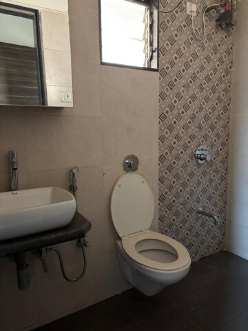 Bathroom in 2 BHK Apartment at Vihang Hills, Ghodbunder Road – for Rent