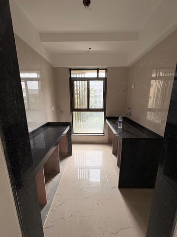 Kitchen in 2 BHK Apartment at Neminath Nemi Bhavan, Goregaon West – for Sale