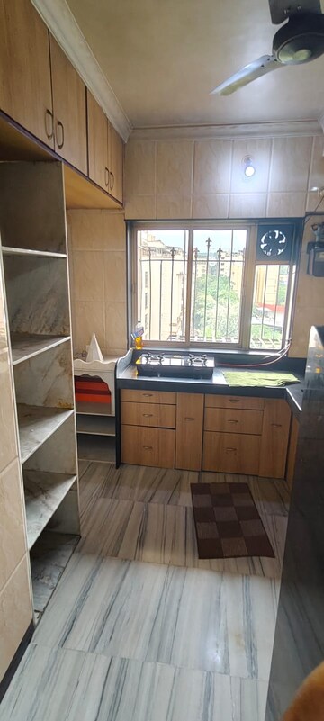 Kitchen in 2 BHK Apartment at Kabra Hyde Park, Manpada – for Rent