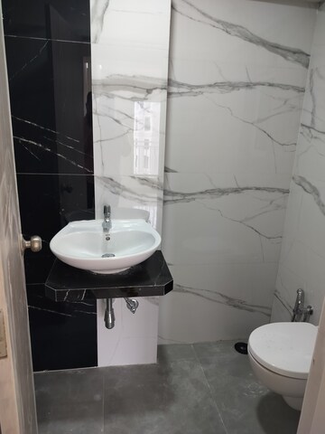 Bathroom in 2 BHK Apartment at Chandiwala Pearl Regency, Andheri West – for Sale