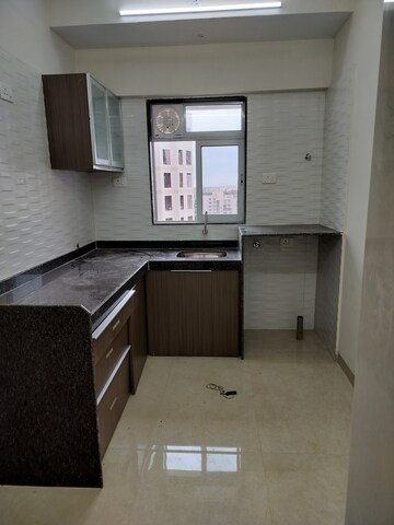Kitchen in 2 BHK Apartment at Chandiwala Pearl Regency, Andheri West – for Sale