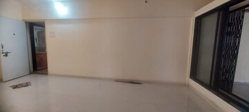 Room in 2 BHK Apartment at Ramkunj CHS , Ganeshwadi – for Sale
