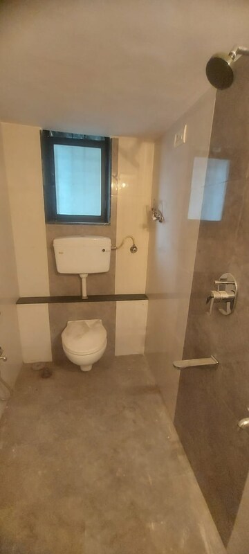 Bathroom in 2 BHK Apartment at Ramkunj CHS , Ganeshwadi – for Sale