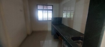 Kitchen in 2 BHK Apartment at Ramkunj CHS , Ganeshwadi – for Sale