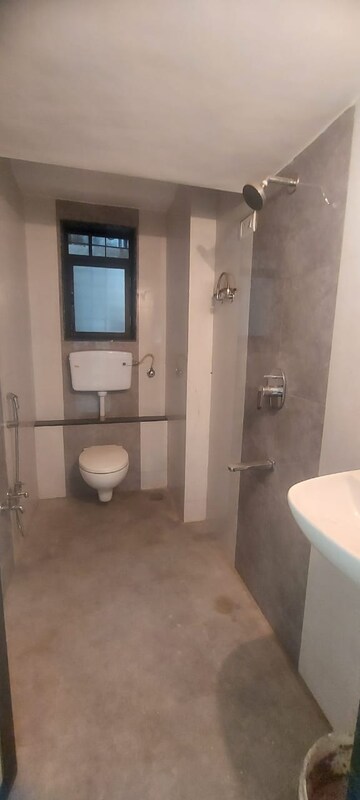 Bathroom in 2 BHK Apartment at Ramkunj CHS , Ganeshwadi – for Sale