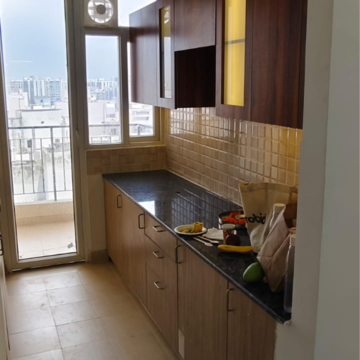 Kitchen in 3 BHK Apartment at Amrapali Crystal Homes, Sector 76 – for Rent