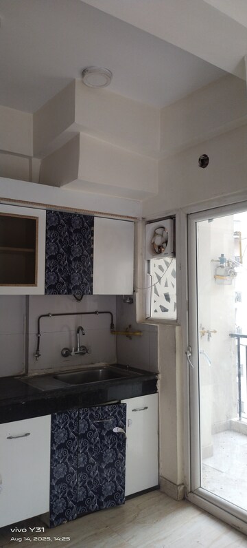 Kitchen in 2.5 BHK Apartment at Town Park White Orchid, Sector 16c Greater Noida – for Sale