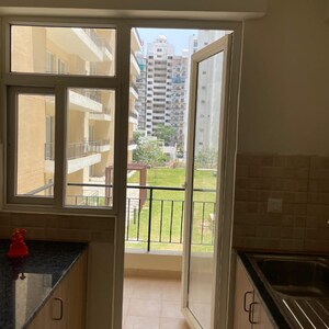 Kitchen in 3 BHK Apartment at Amrapali Crystal Homes, Sector 76 – for Sale