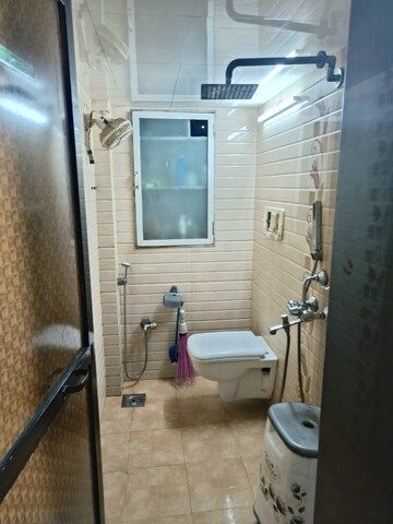 Bathroom in 2 BHK Apartment at Rajkumar Corner CHS, Andheri West – for Rent