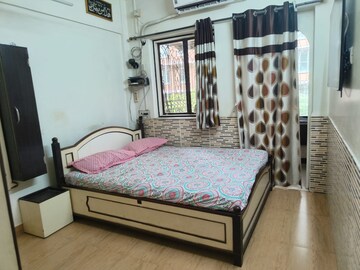 Bedroom in 2 BHK Apartment at Rajkumar Corner CHS, Andheri West – for Rent