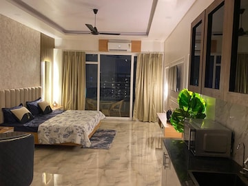 Living Room in Studio Apartment at Gaur City Center, Sector 4 Greater Noida – for Rent