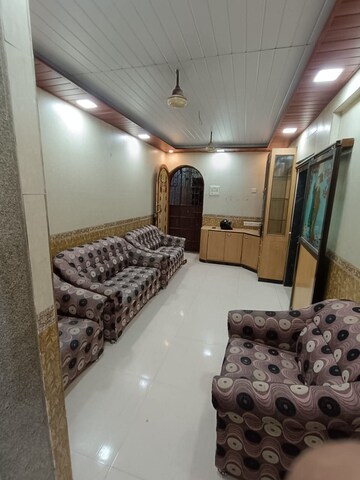 Living Room in 1 BHK Apartment at Sawan Plaza CHS, Kopar Khairane – for Rent