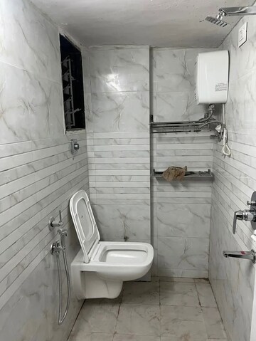 Bathroom in 1 BHK Apartment at Sawan Plaza CHS, Kopar Khairane – for Rent