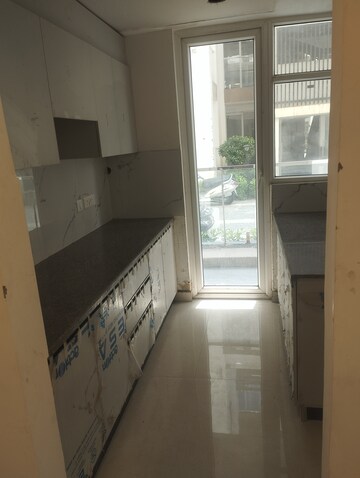 Kitchen in 1 RK Apartment at Nimbus The Palm Village, Sector 22a Yamuna Expressway – for Sale