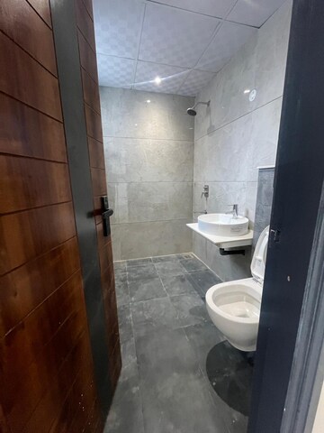 Bathroom in 3 BHK Apartment at Dhakoli – for Sale