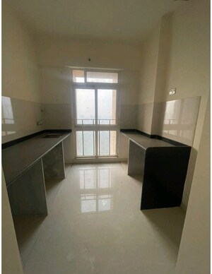 Kitchen in 3 BHK Apartment at Vijay Orovia, Ghodbunder Road – for Sale