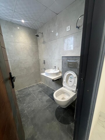 Bathroom in 3 BHK Apartment at Dhakoli – for Sale