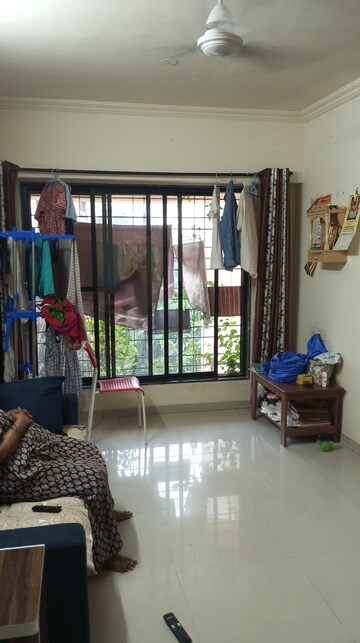 Living Room in 2 BHK Apartment at Raunak Unnathi Woods Phase 4 And 5, Ghodbunder Road – for Rent