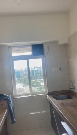 Bathroom in 1 BHK Apartment at Crescent Landmark, Andheri East – for Sale
