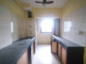 Kitchen in 2 BHK Apartment at Laxmi Royal Classic, Mulund West – for Rent