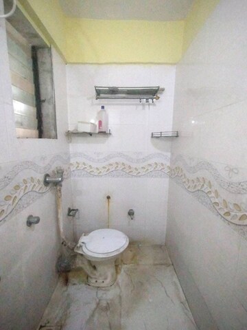 Bathroom in 2 BHK Apartment at Laxmi Royal Classic, Mulund West – for Rent
