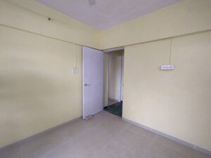 Bedroom in 2 BHK Apartment at Laxmi Royal Classic, Mulund West – for Rent