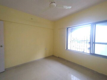 Bedroom in 2 BHK Apartment at Laxmi Royal Classic, Mulund West – for Rent