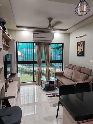 Living Room in 2 BHK Apartment at Lodha Crown Quality Homes, Majiwada – for Sale