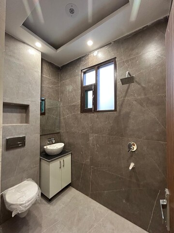 Bathroom in 3 BHK Builder Floor at Dhakoli – for Sale
