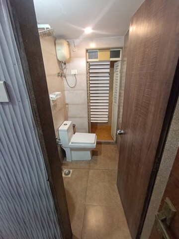 Bathroom in 1.5 BHK Apartment at Juhi Lawns, Seawoods – for Rent