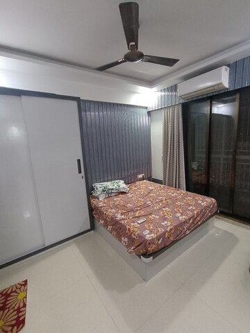 Bedroom in 1.5 BHK Apartment at Juhi Lawns, Seawoods – for Rent