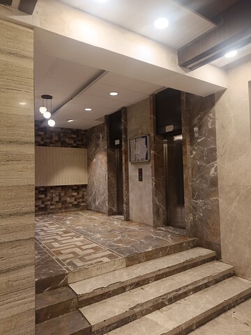 Building Lobby in 1.5 BHK Apartment at Juhi Lawns, Seawoods – for Rent