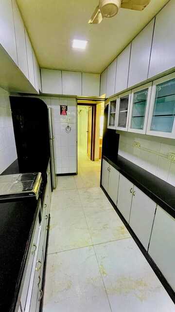 Kitchen in 3 BHK Apartment at Shanti Niketan Malad, Orlem – for Rent