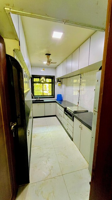 Kitchen in 3 BHK Apartment at Shanti Niketan Malad, Orlem – for Rent