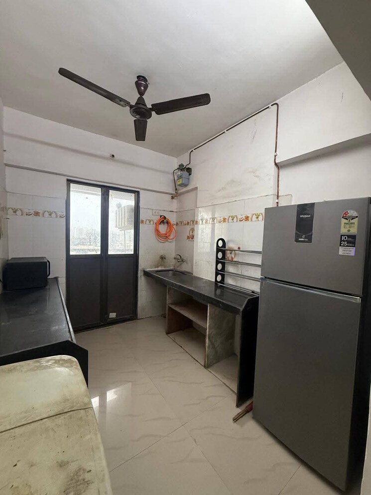 Kitchen, azad nagar 1 Bedroom 410 Sq.Ft. Apartment In Azad Nagar Mumbai 9070054