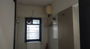 Bathroom in 1 BHK Apartment at Runwal Pearl, Manpada – for Rent